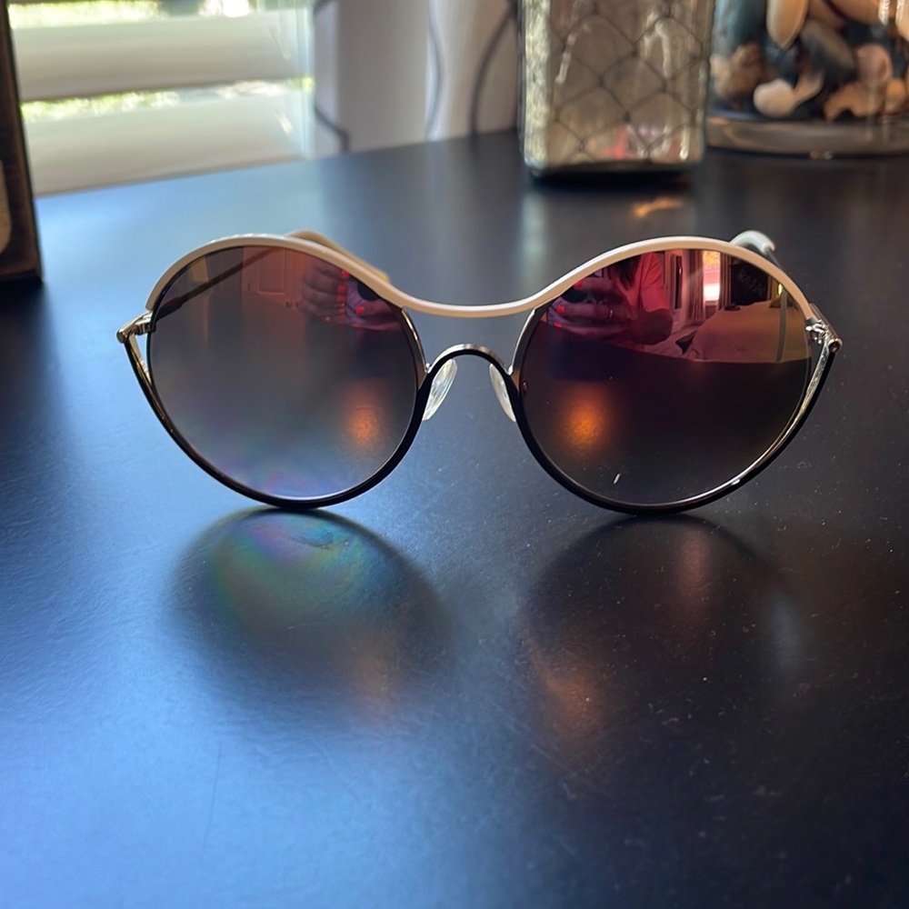 Balmain sunglasses made in France. Creamy white and sliver . Wore 1 x